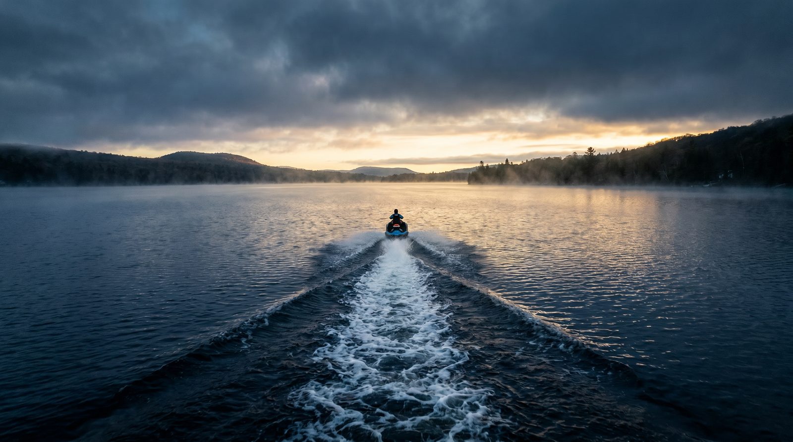 Sea-Doo Spark Trixx on misty lake at dawn